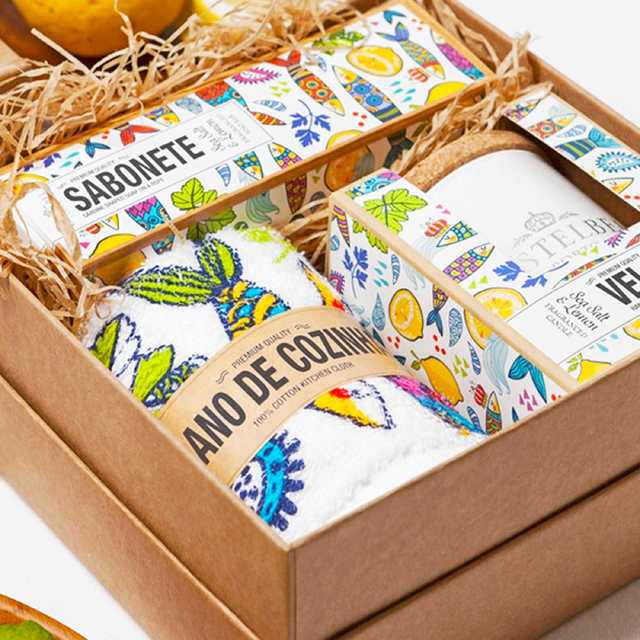 Gift box set featuring soap and kitchen textiles with a colorful sardine and lemon pattern, illustration by MarushaBelle